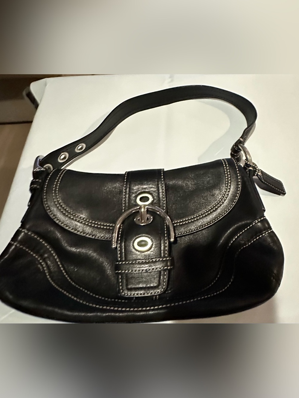 Black Leather Shoulder Bag with Buckle Accent by Coach